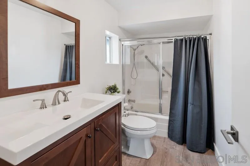 1944 Fairway Cir Drive San Marcos, CA 92078 - Photo 14 of 38 a bathroom with a sink a toilet and shower