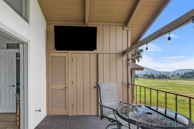 1944 Fairway Cir Drive San Marcos, CA 92078 - Photo 17 of 38 a view of balcony with furniture and flat screen tv