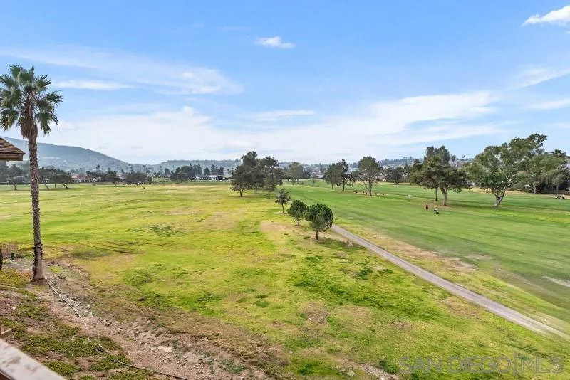 1944 Fairway Cir Drive San Marcos, CA 92078 - Photo 19 of 38 a view of a lake with houses in the background