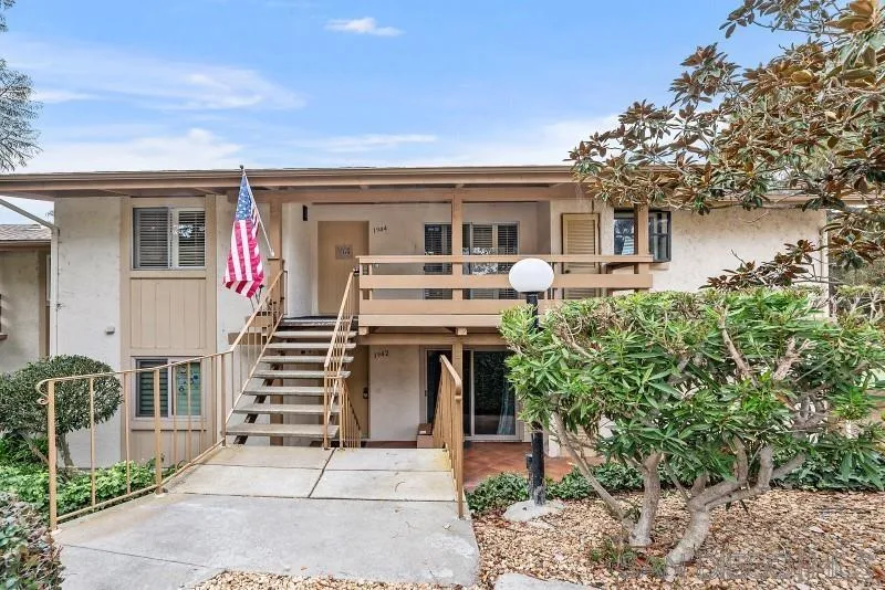 1944 Fairway Cir Drive San Marcos, CA 92078 - Photo 2 of 38 a front view of house with yard outdoor seating and barbeque oven in front of it