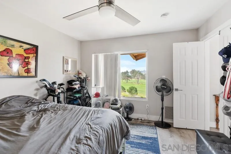 1944 Fairway Cir Drive San Marcos, CA 92078 - Photo 22 of 38 a bed room with a bed and a chair