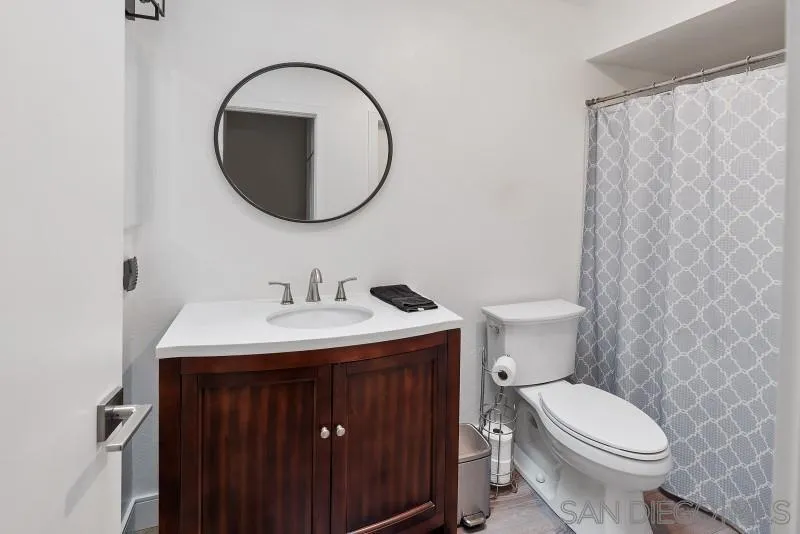 1944 Fairway Cir Drive San Marcos, CA 92078 - Photo 23 of 38 a bathroom with a sink and a toilet