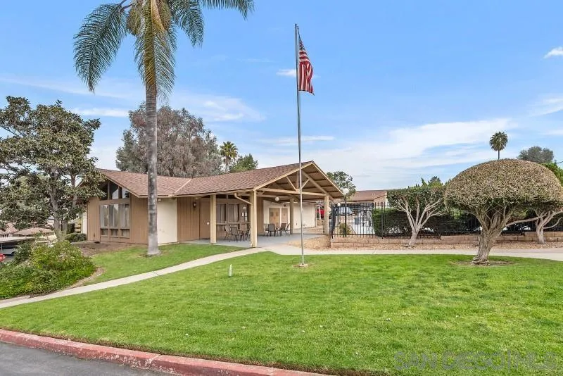 1944 Fairway Cir Drive San Marcos, CA 92078 - Photo 27 of 38 a front view of a house with garden and trees