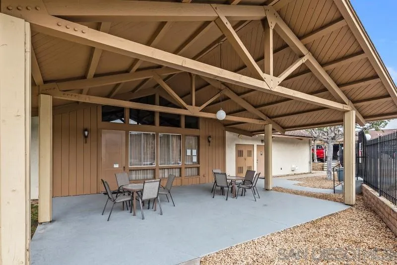 1944 Fairway Cir Drive San Marcos, CA 92078 - Photo 28 of 38 a view of a hall with table and chairs