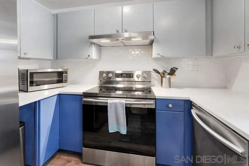 1944 Fairway Cir Drive San Marcos, CA 92078 - Photo 7 of 38 a stove top oven sitting inside of a kitchen