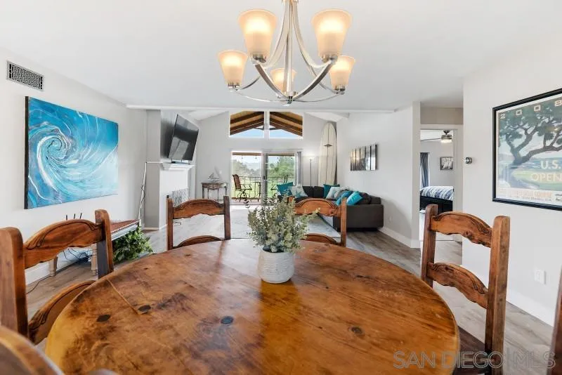 1944 Fairway Cir Drive San Marcos, CA 92078 - Photo 9 of 38 a dining room filled with furniture and a chandelier