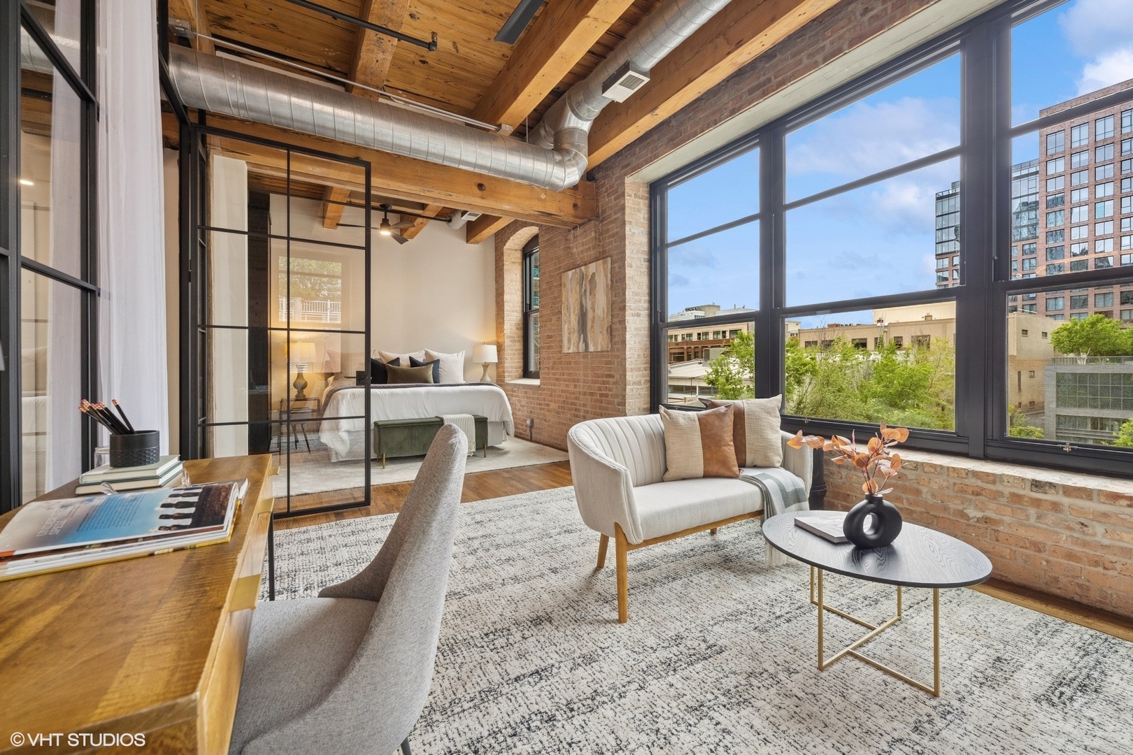 14 North Peoria Street, Unit 3E Chicago, IL 60607 - Photo 16 of 27 a living room with furniture and a large window