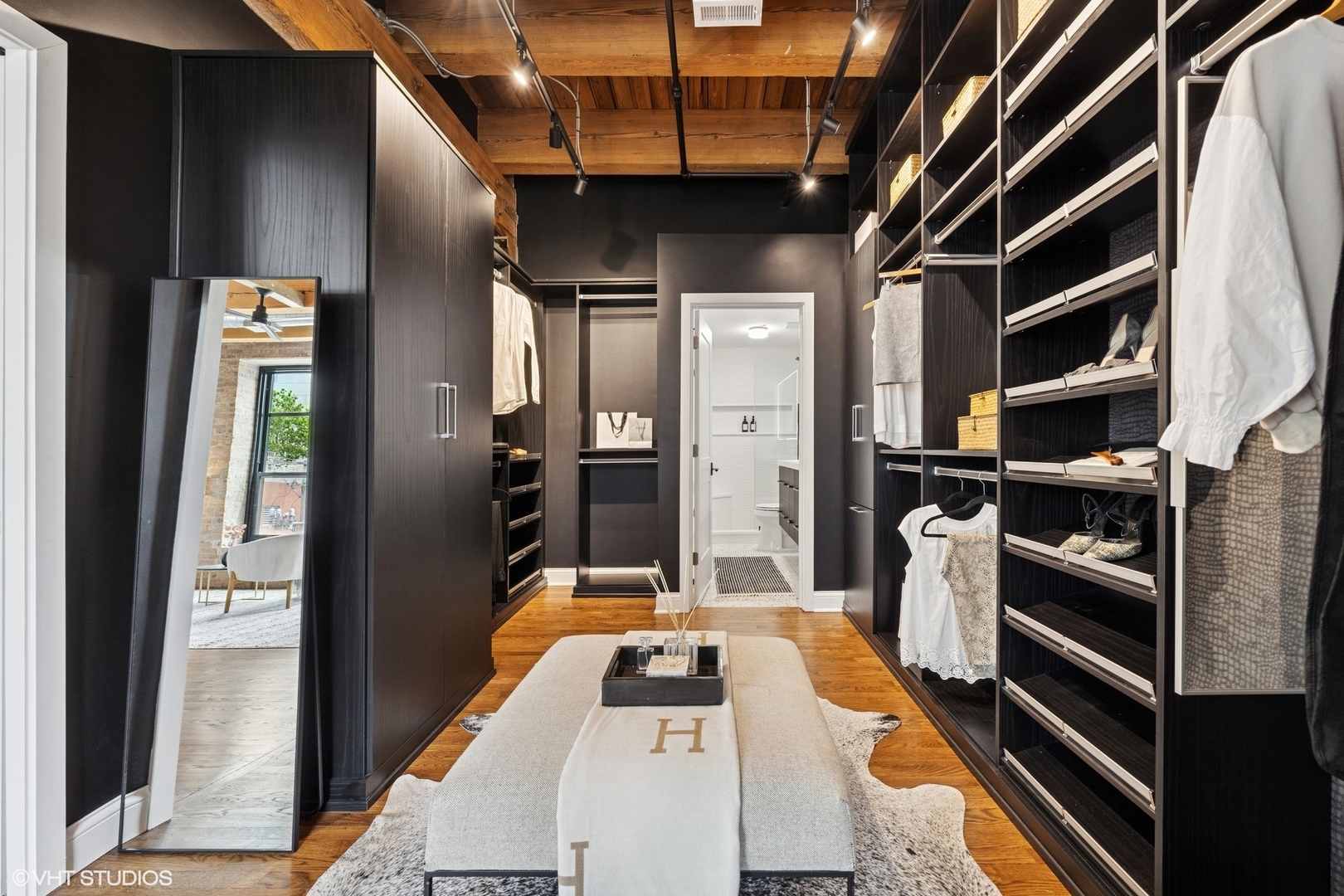 14 North Peoria Street, Unit 3E Chicago, IL 60607 - Photo 20 of 27 a kitchen with kitchen island a counter and a refrigerator