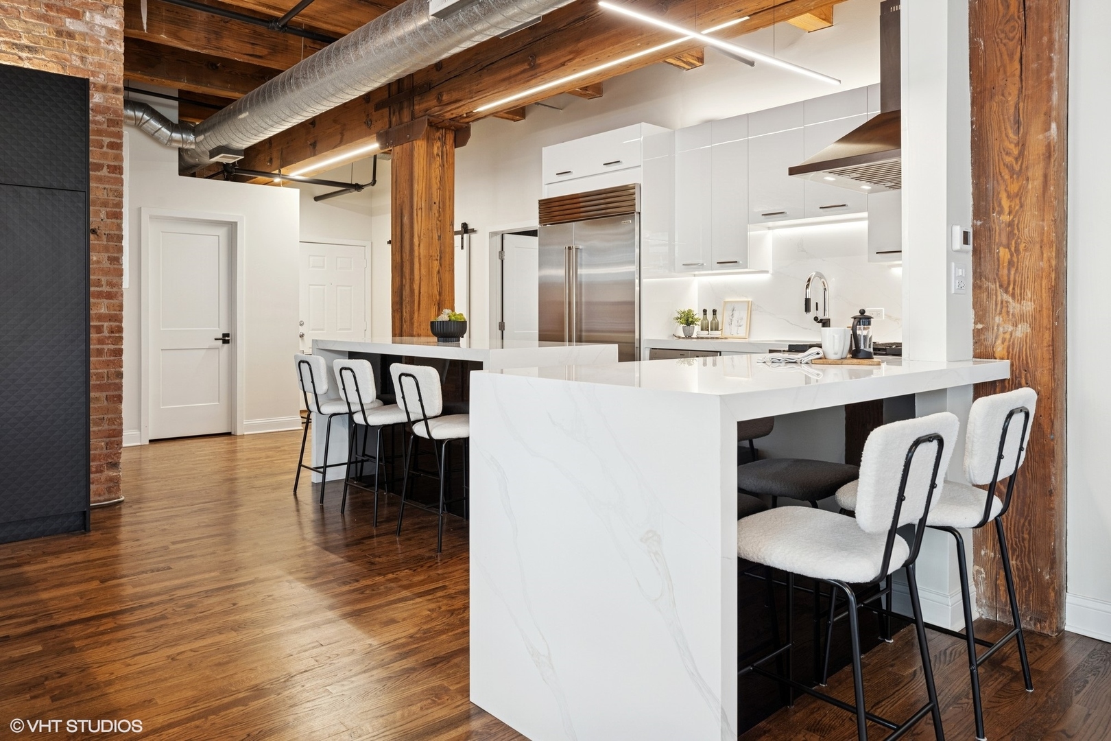 14 North Peoria Street, Unit 3E Chicago, IL 60607 - Photo 7 of 27 a dining room with furniture and wooden floor
