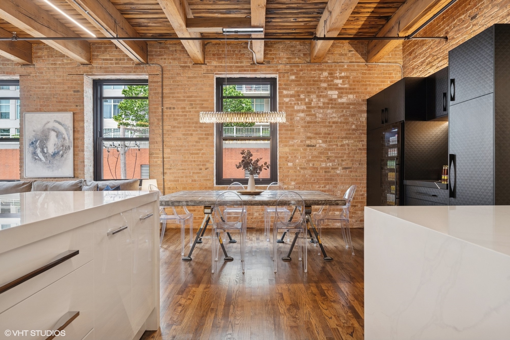14 North Peoria Street, Unit 3E Chicago, IL 60607 - Photo 8 of 27 a dining hall with stainless steel appliances kitchen island granite countertop a dining table chairs and granite counter tops