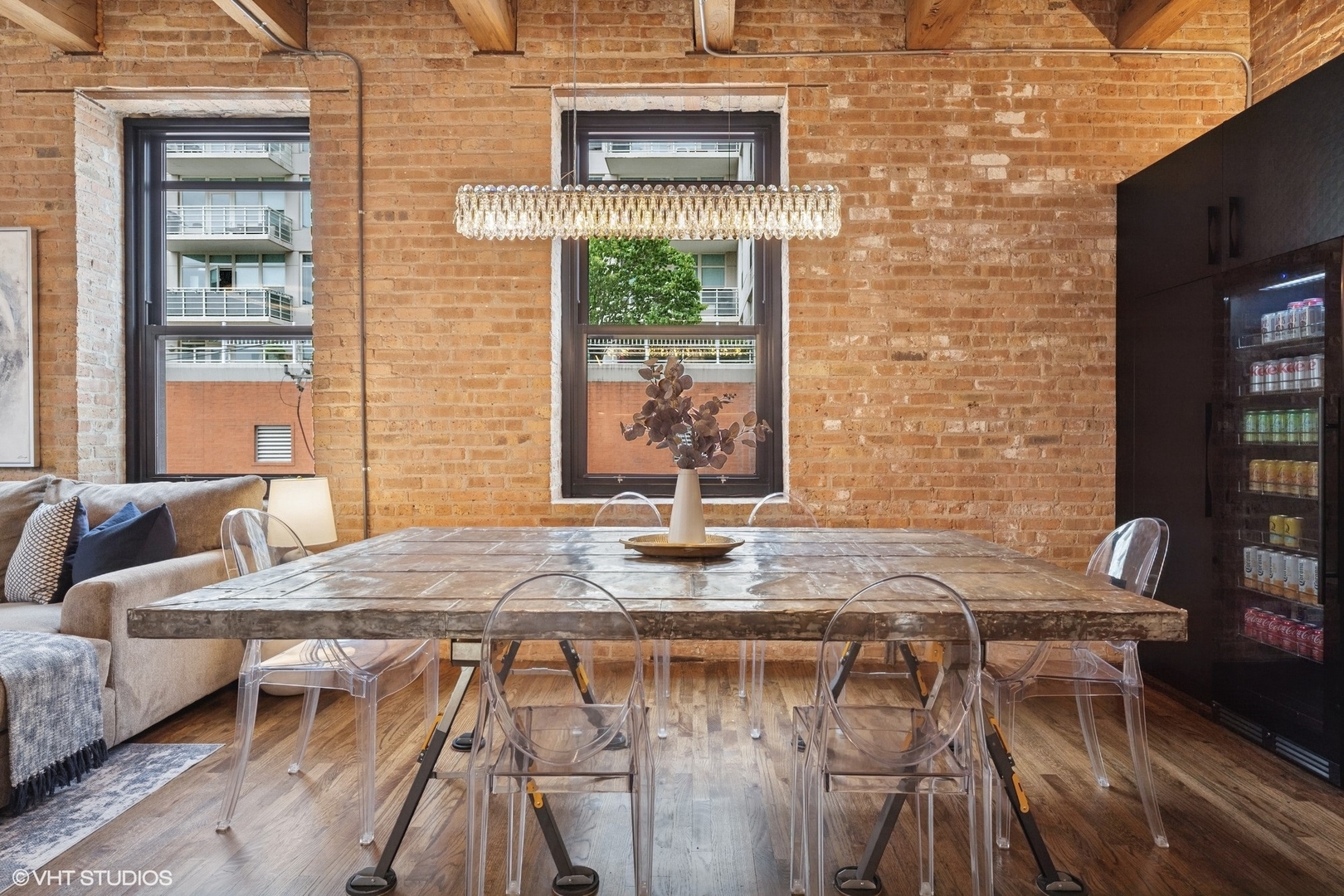 14 North Peoria Street, Unit 3E Chicago, IL 60607 - Photo 9 of 27 a view of a dining room with furniture and wooden floor