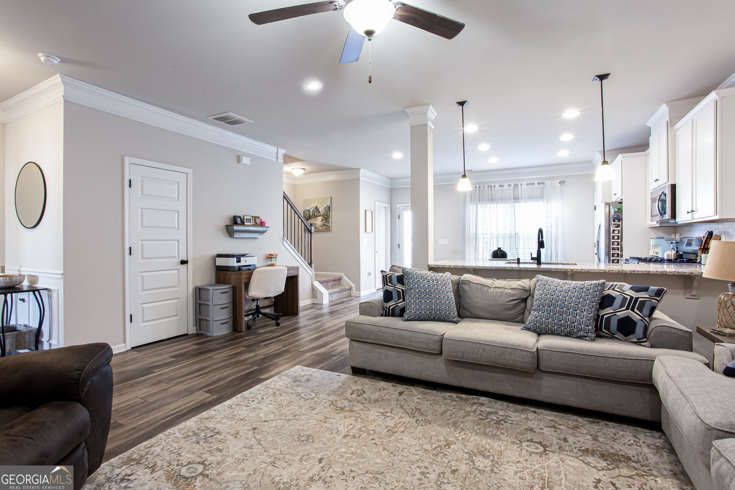 95 Bromes Street Lawrenceville, GA 30046 - Photo 11 of 37 a living room with furniture and kitchen view
