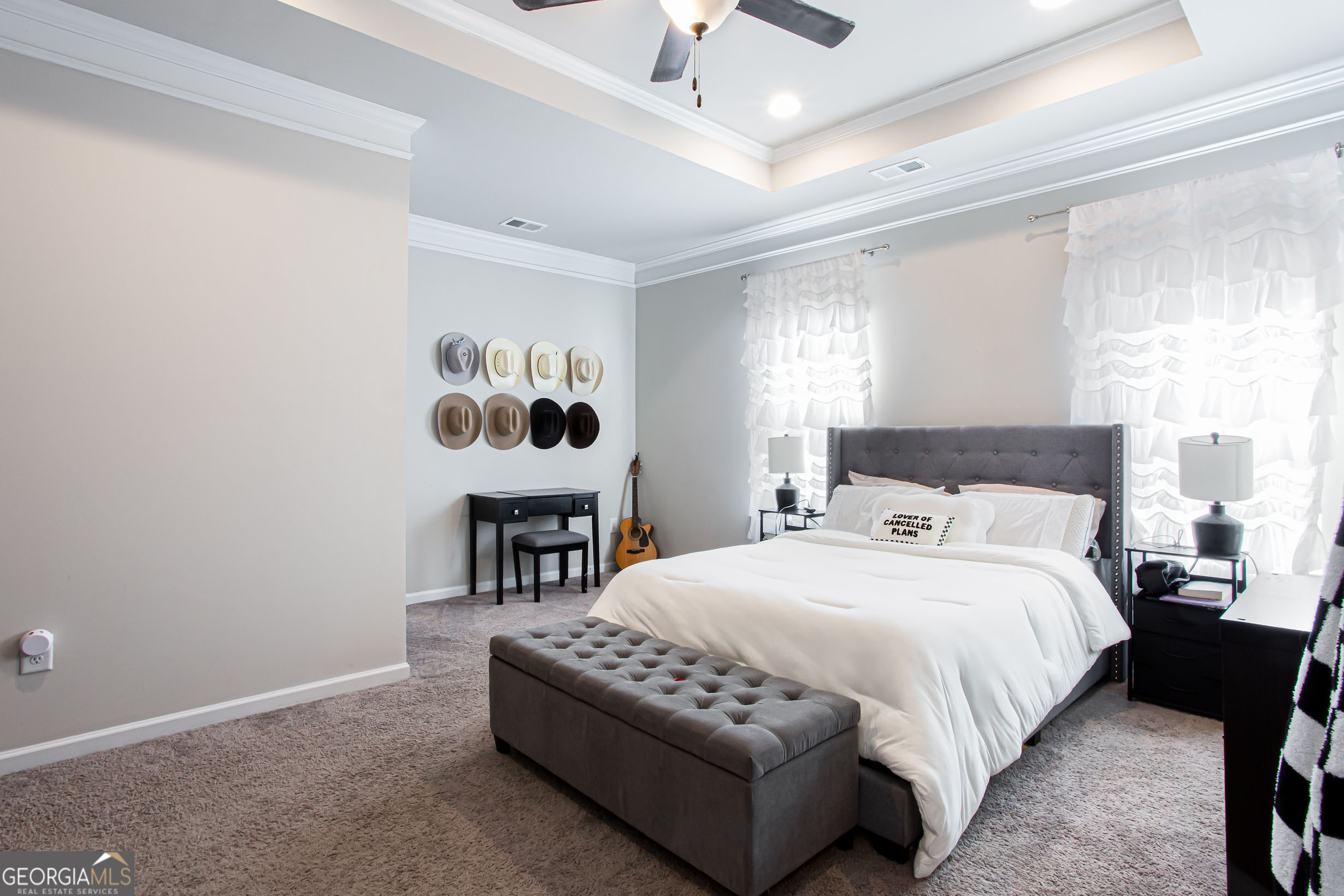 95 Bromes Street Lawrenceville, GA 30046 - Photo 18 of 37 a bedroom with a bed furniture and a chandelier