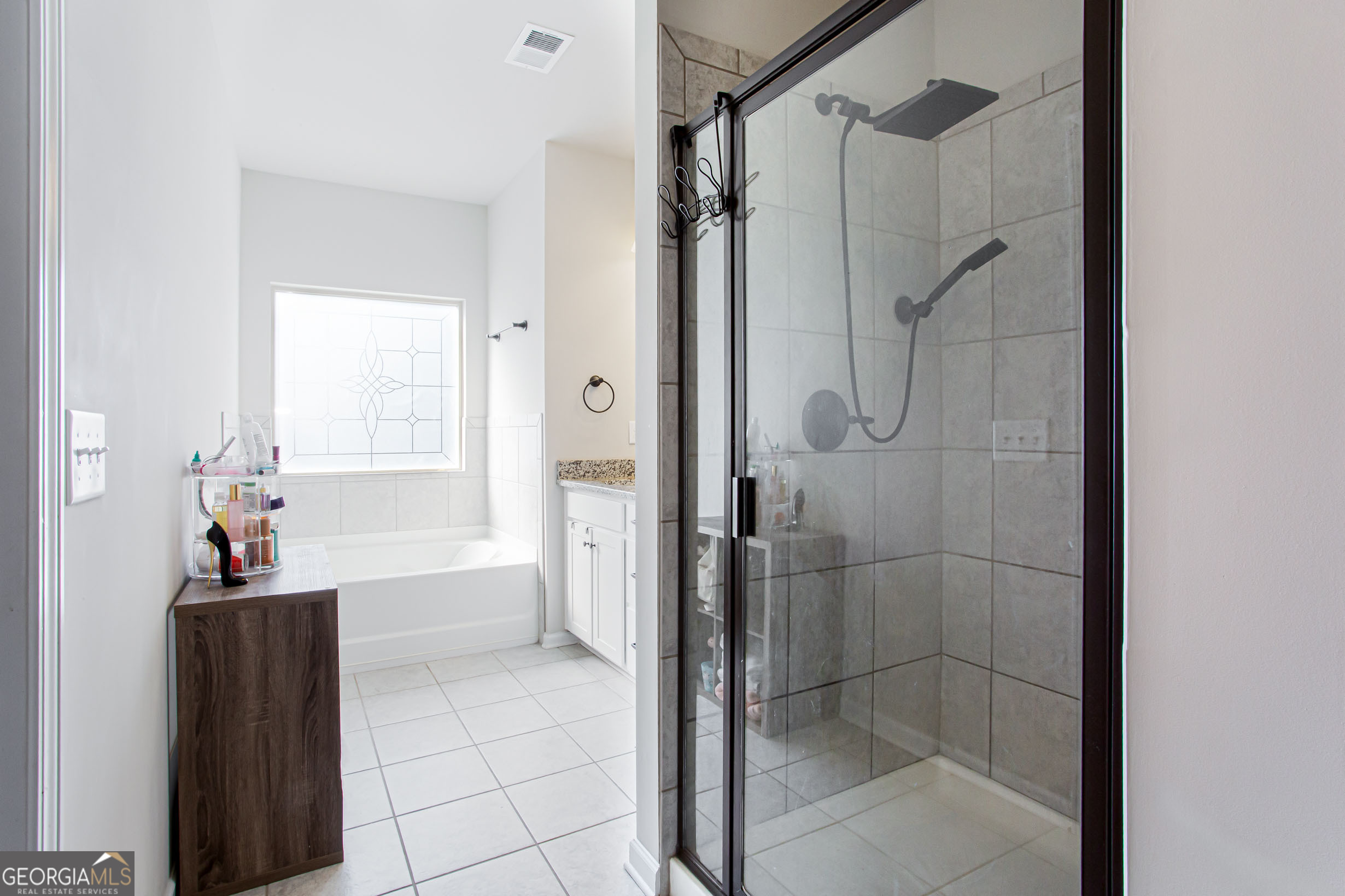95 Bromes Street Lawrenceville, GA 30046 - Photo 21 of 37 a bathroom with a shower