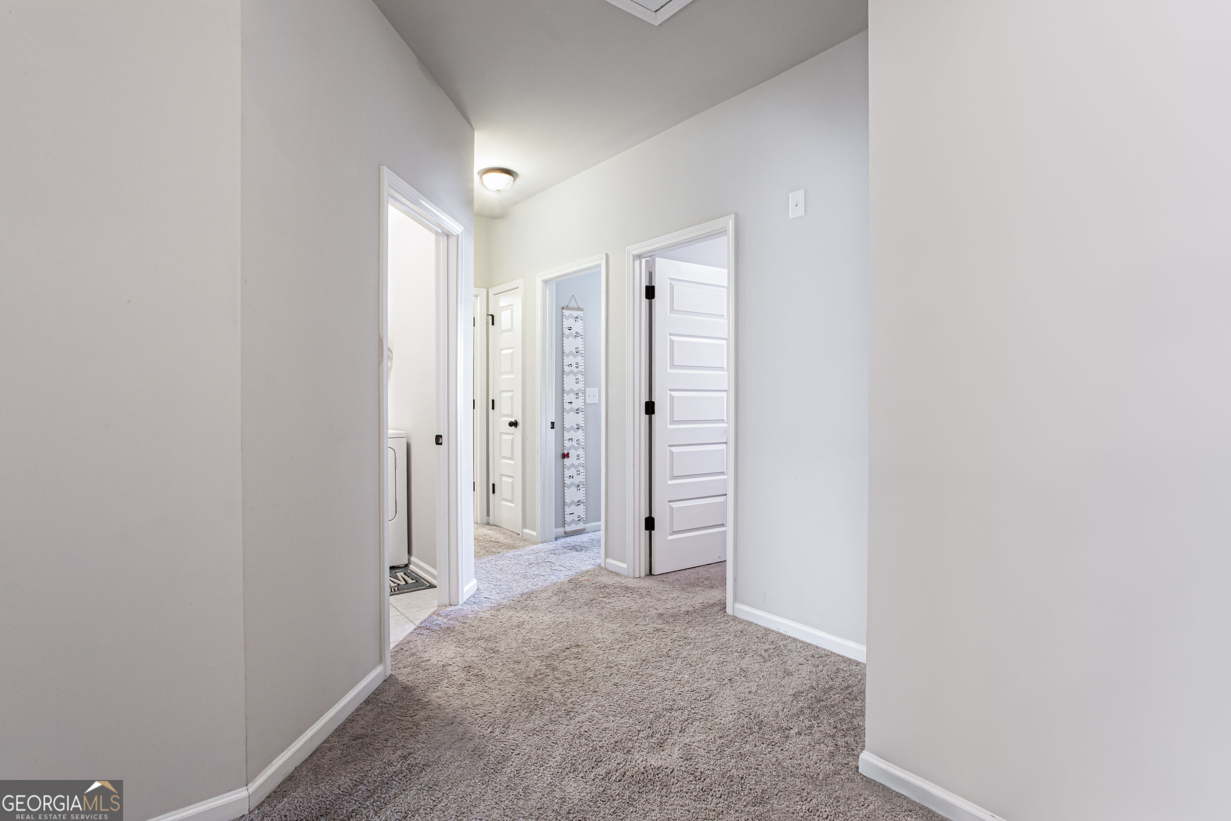 95 Bromes Street Lawrenceville, GA 30046 - Photo 27 of 37 a view of hallway with closet