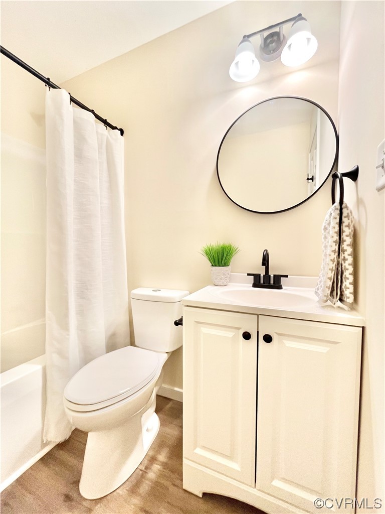 6626 Jackson Road Quinton, VA 23141 - Photo 23 of 40 Full bathroom in the hall with vanity, toilet, and