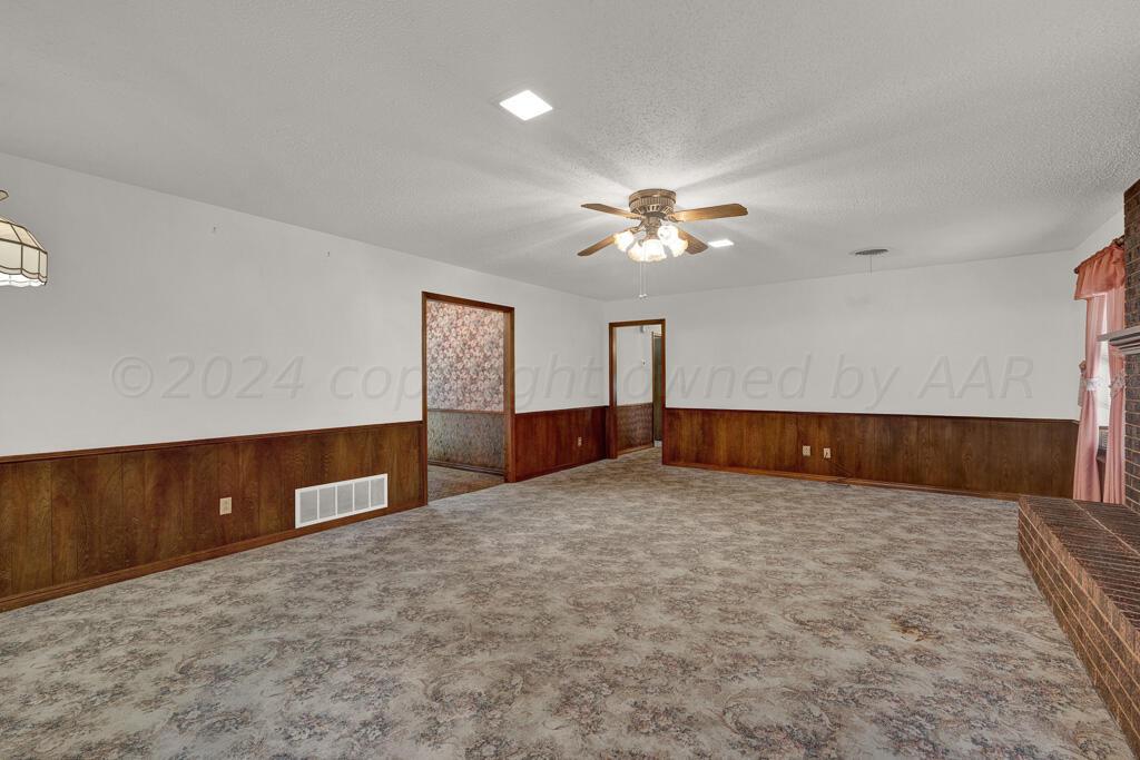 8406 Olympia Drive Amarillo, TX 79110 - Photo 6 of 19 living room 2