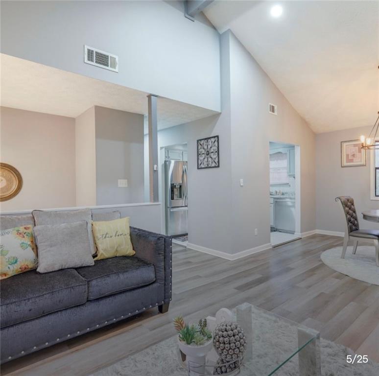 3468 Deer Trace Lithonia, GA 30038 - Photo 1 of 18 a living room with furniture and wooden floor