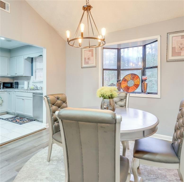 3468 Deer Trace Lithonia, GA 30038 - Photo 17 of 18 a dining room with furniture and window