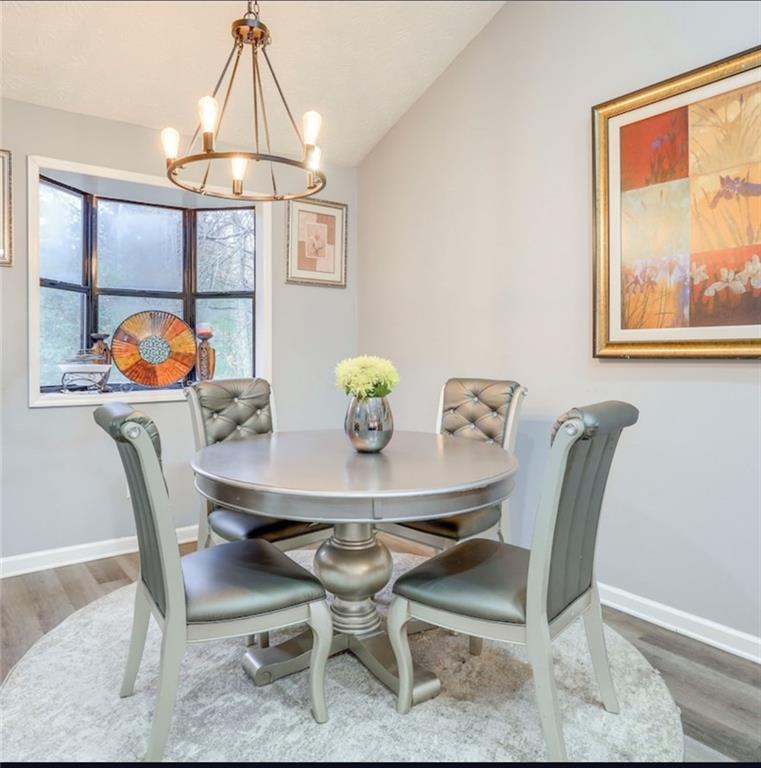 3468 Deer Trace Lithonia, GA 30038 - Photo 18 of 18 a view of a dining room with furniture