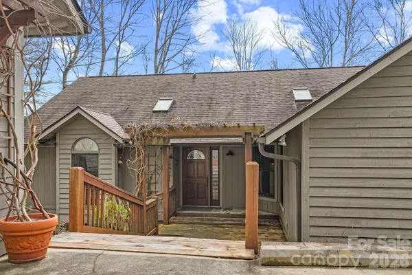 a view of house with a outdoor space