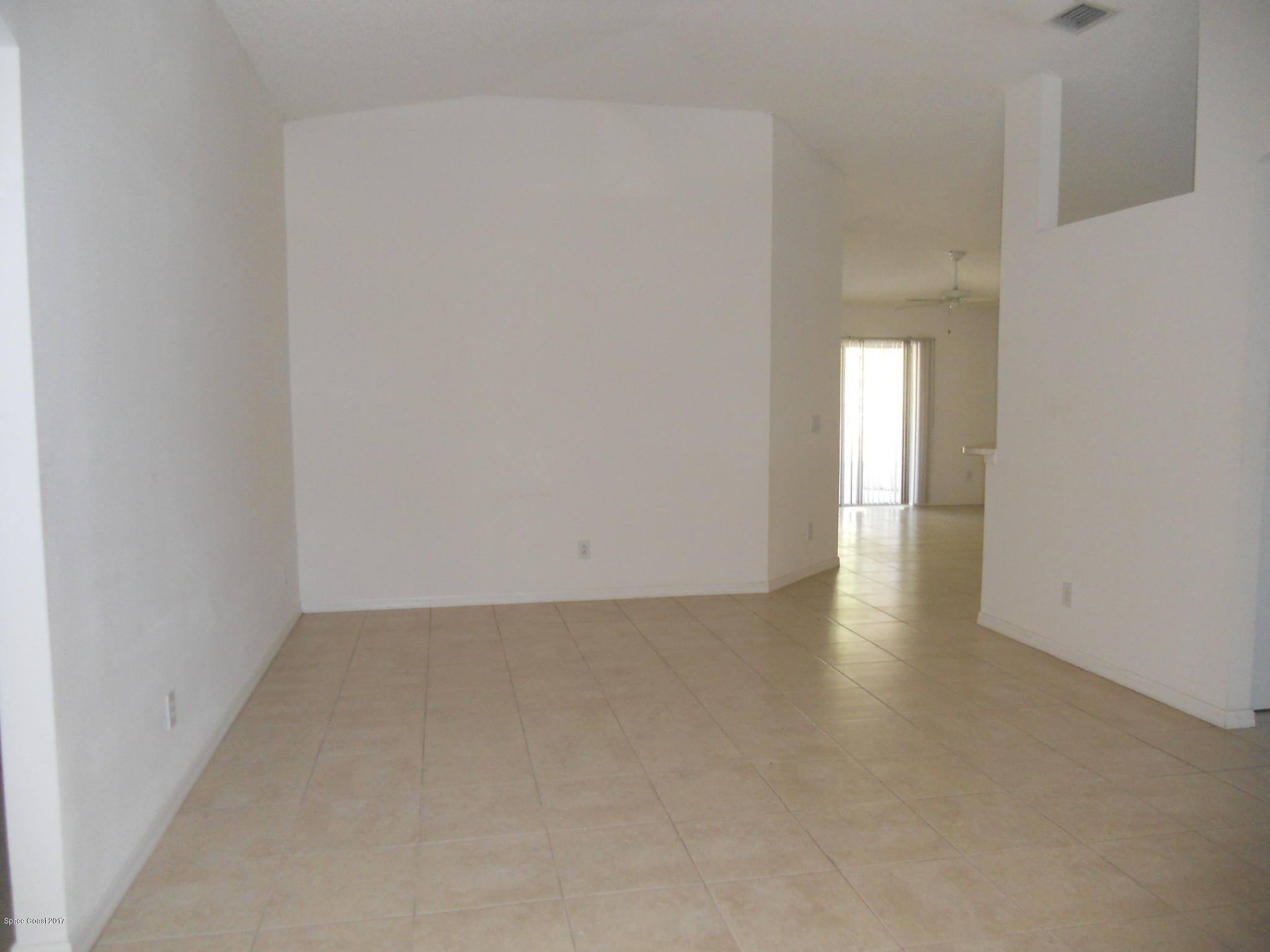 540 Benton Drive Melbourne, FL 32901 - Photo 7 of 14 a view of an empty room and window