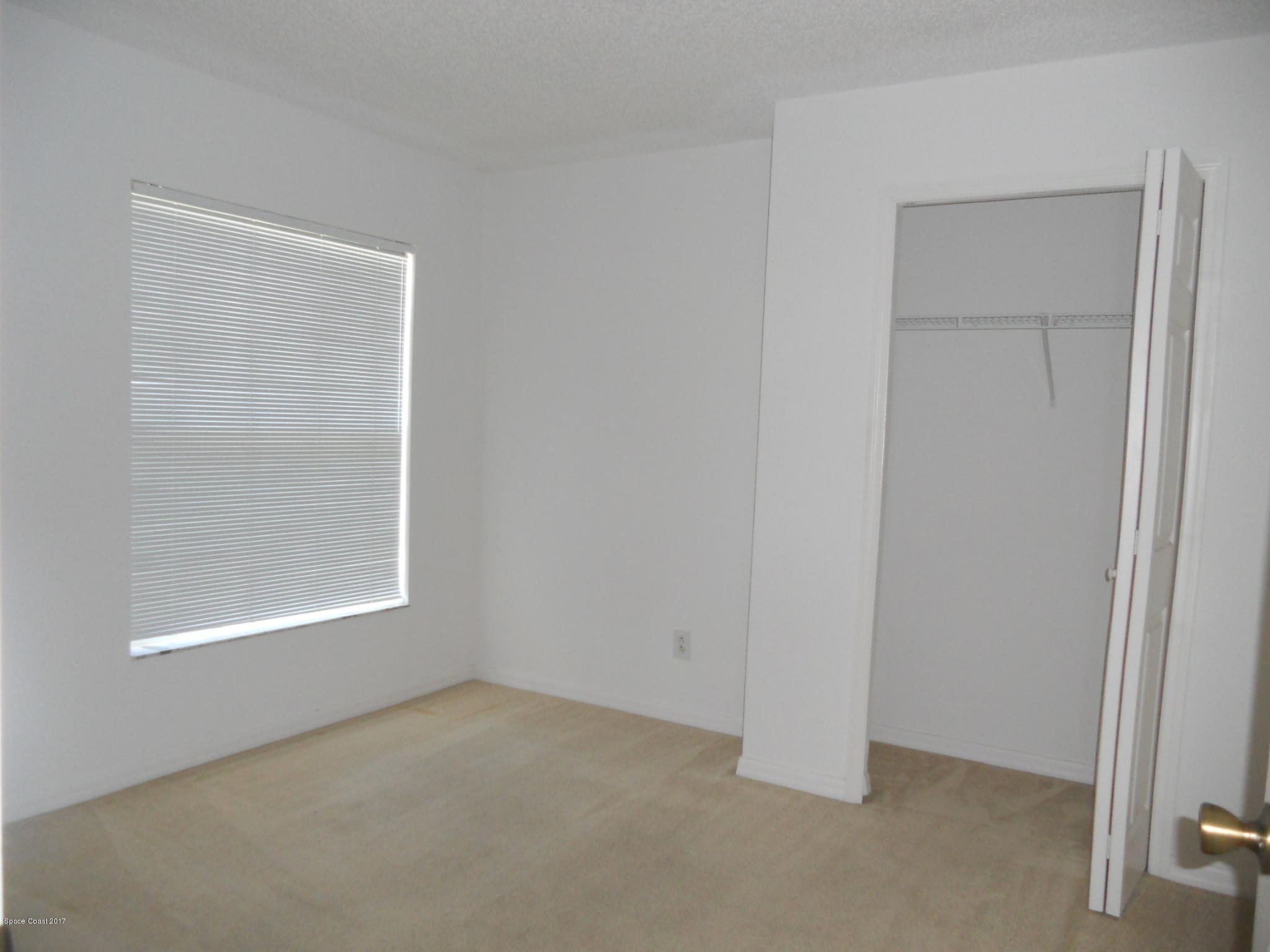 540 Benton Drive Melbourne, FL 32901 - Photo 10 of 14 an empty room with a window