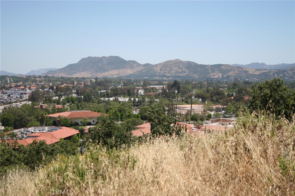 0 Foothill & Manzanita Thousand Oaks, CA 91361 - Photo 3 of 9 a view of a city with lush green forest