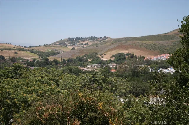 an aerial view of mountain with trees