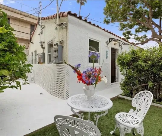 a table and chairs in a patio
