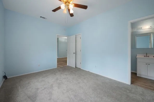 an empty room with a bathroom