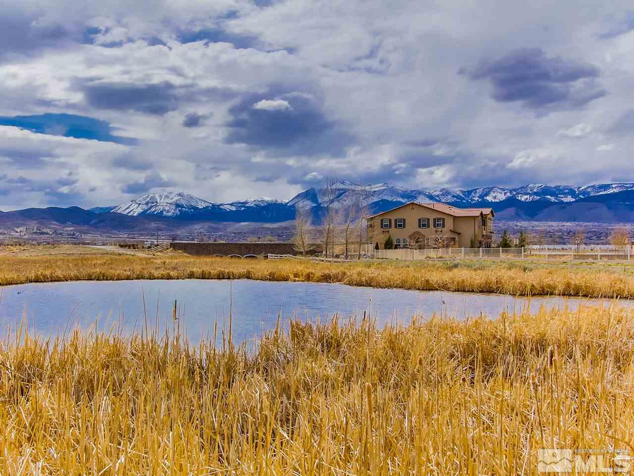 1700 Wind Ranch Road, Unit B Reno, NV 89521 - Photo 1 of 1 a view of an ocean and city