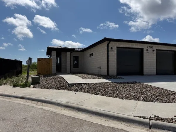 a view of a house with a pathway