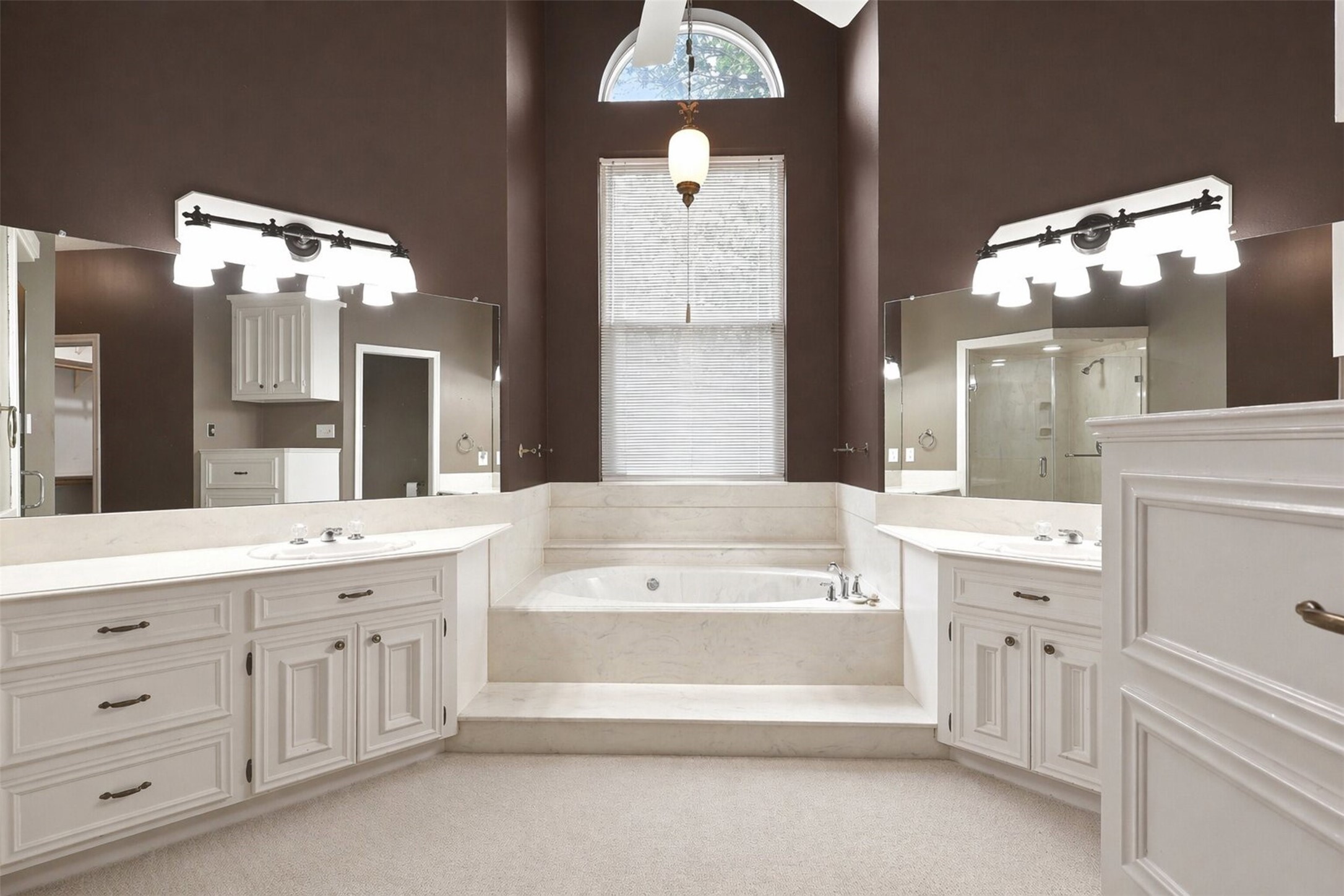 6118 Hampton Way Court Spring, TX 77389 - Photo 15 of 27 Primary bathroom offers double sinks and two closets. Separate tub and shower. Plenty of storage space.