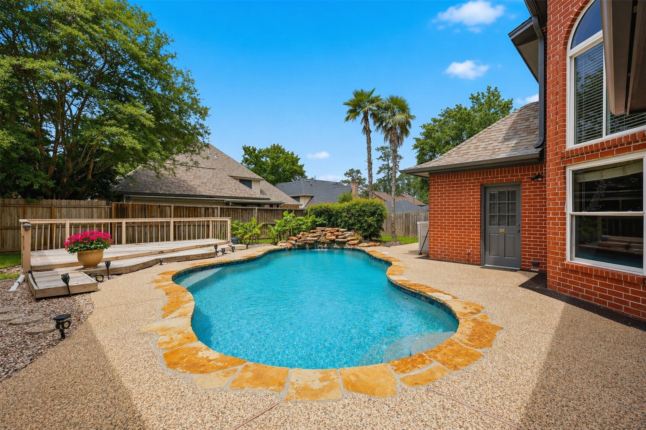 6118 Hampton Way Court Spring, TX 77389 - Photo 5 of 27 New remodeled Gunite Pool with all systems in 2025. This 2002 pool is 15 wide and 29 in depth. There are a couple of doors that lead to the pool. The pool has a fountain, as well.