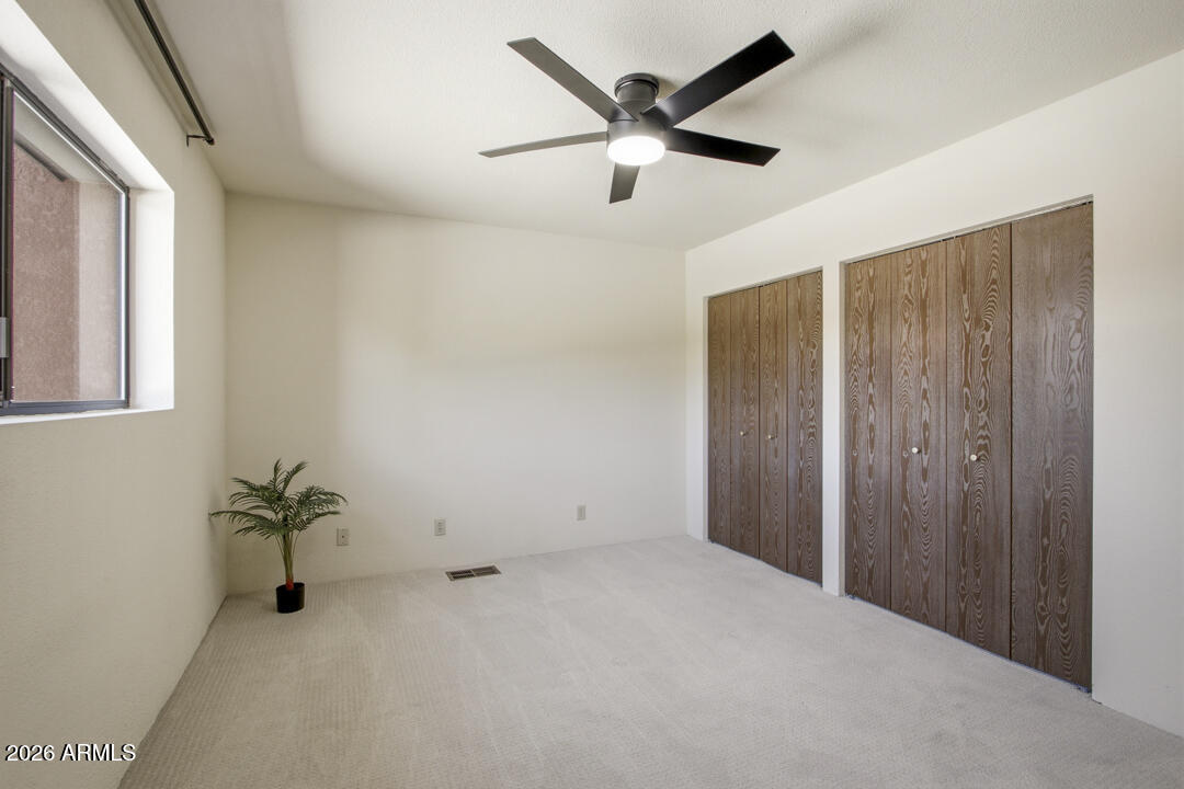 165 Verde Valley School Road, Unit 6 Sedona, AZ 86351 - Photo 30 of 40 a view of a livingroom with a ceiling fan