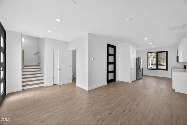a view of a balcony with wooden floor