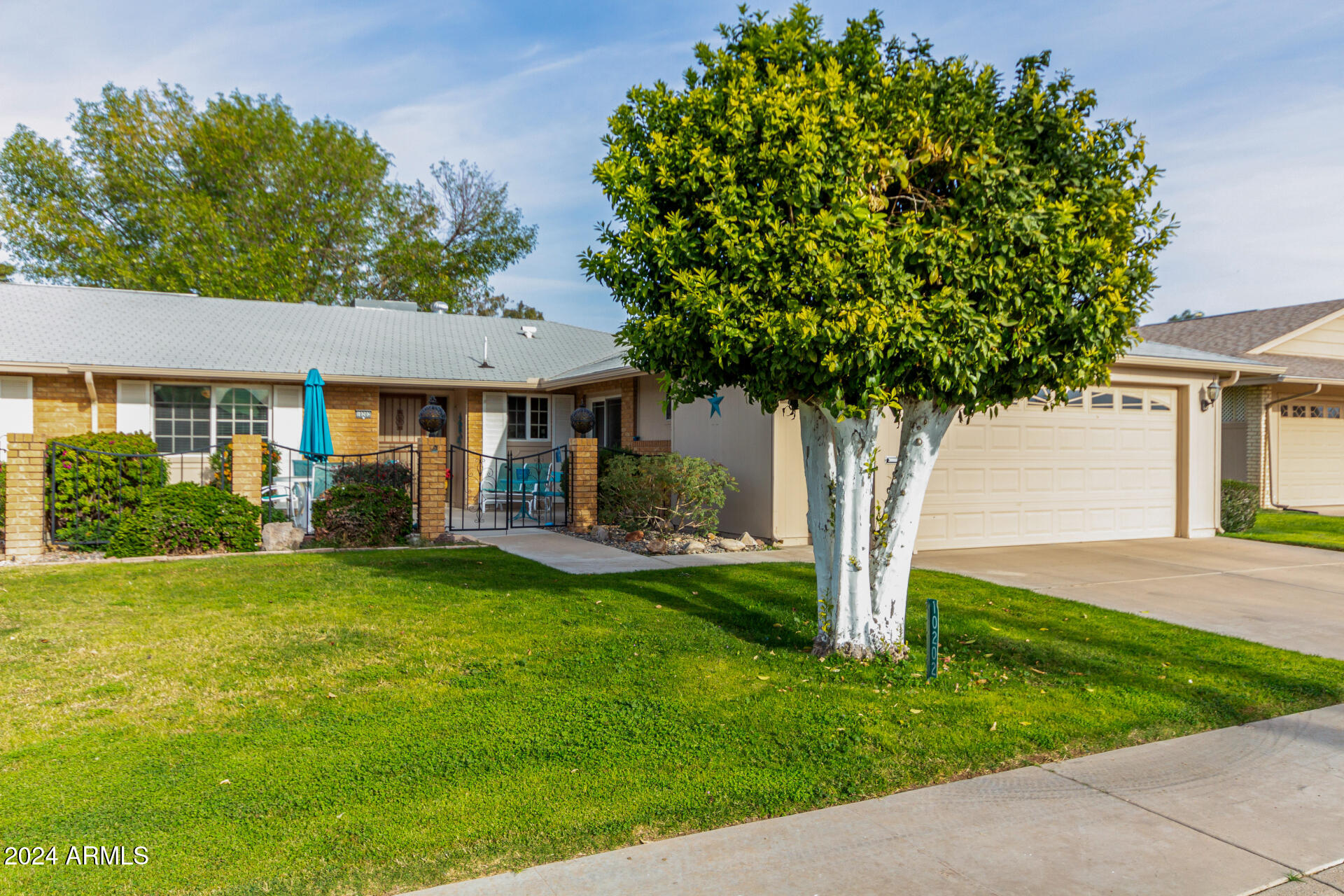 10202 West Mountain View Road Sun City, AZ 85351 - Photo 1 of 37 Front View