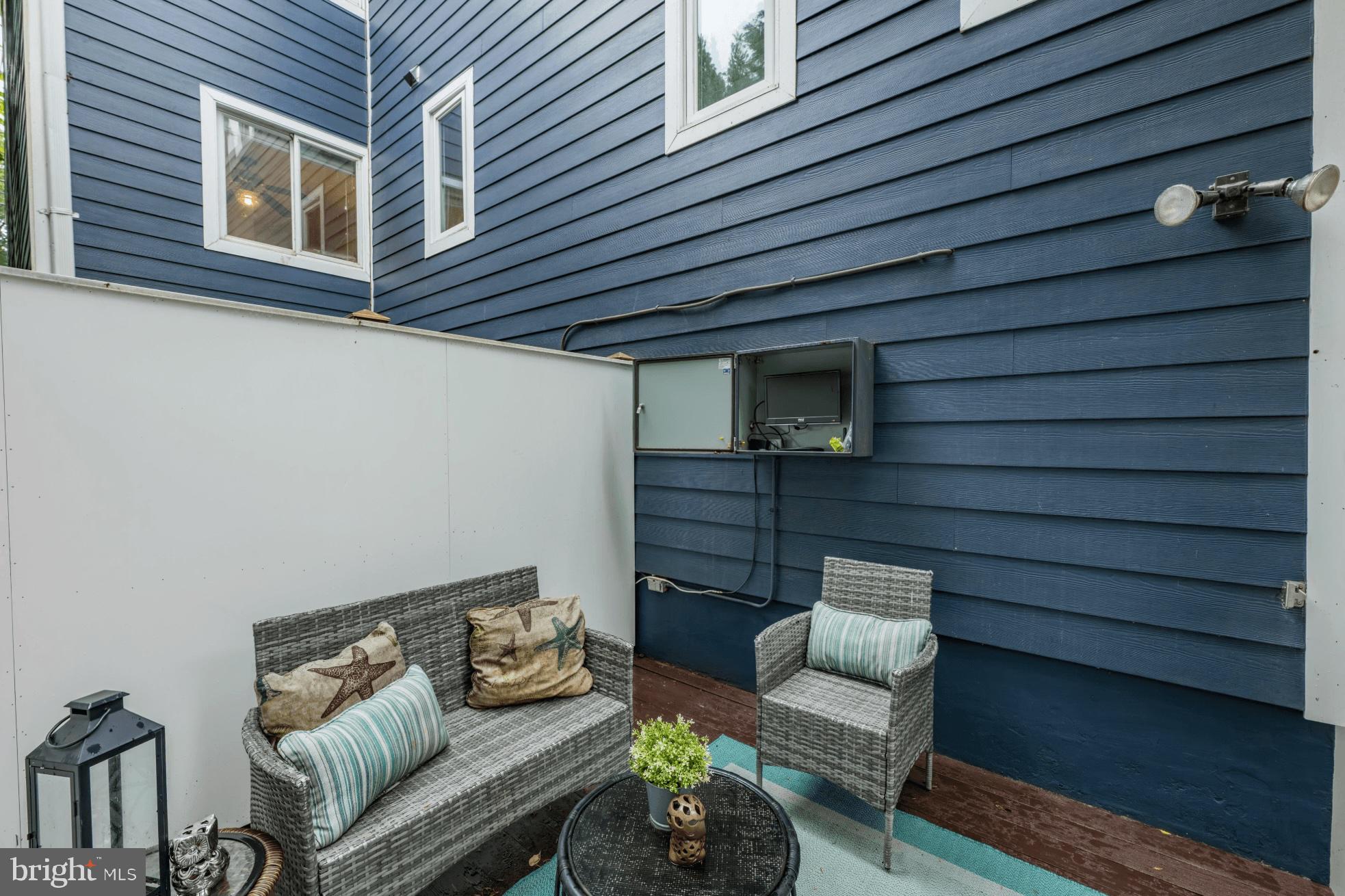 3529 Yuma Street Northwest Washington, DC 20008 - Photo 43 of 46 a outdoor living space with furniture