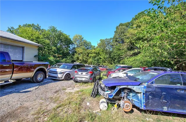 a front view of a house with parking space