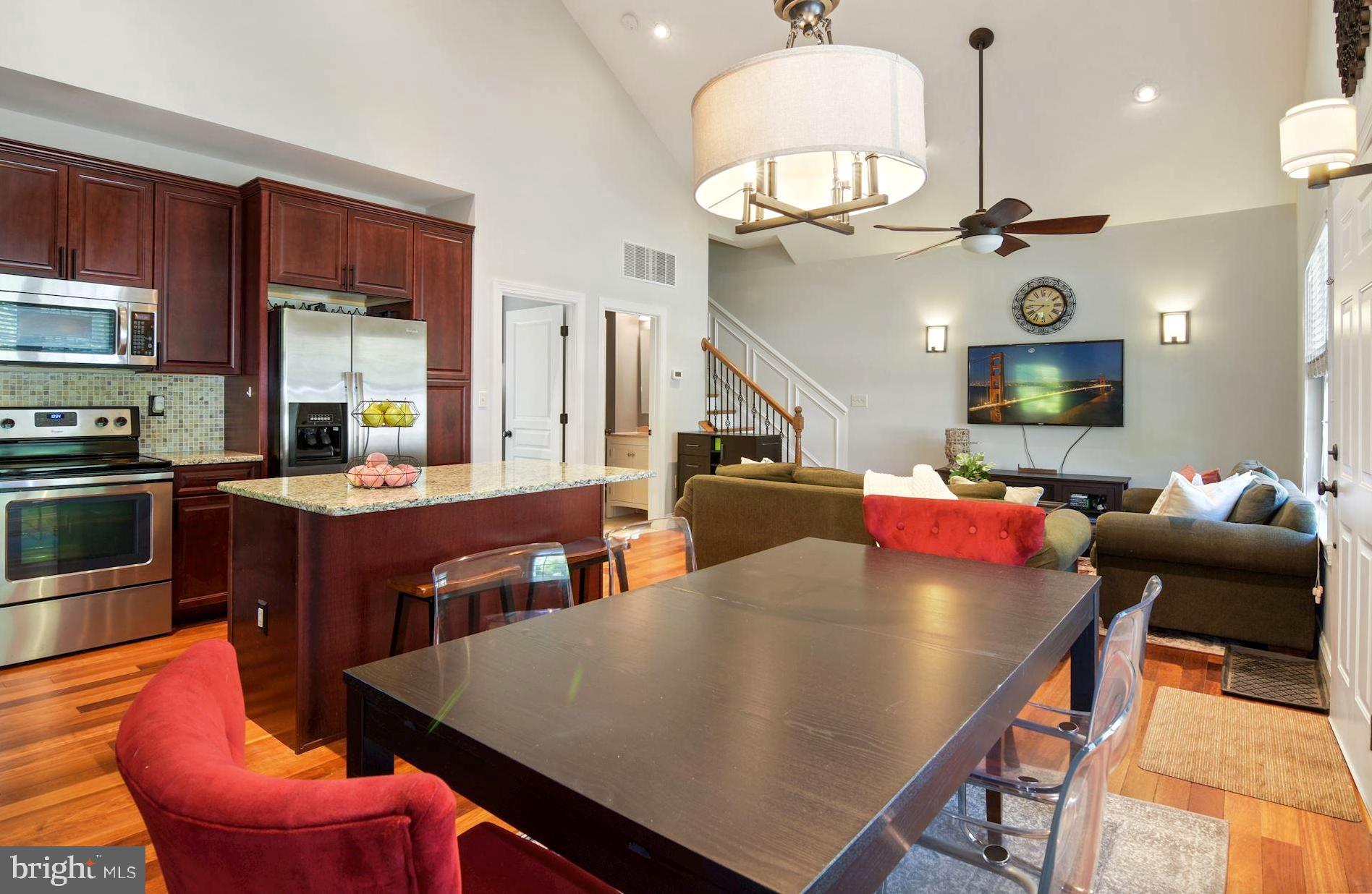 458 Riverside Drive Pasadena, MD 21122 - Photo 11 of 35 Dining Area with Modern Lampshade Chandelier