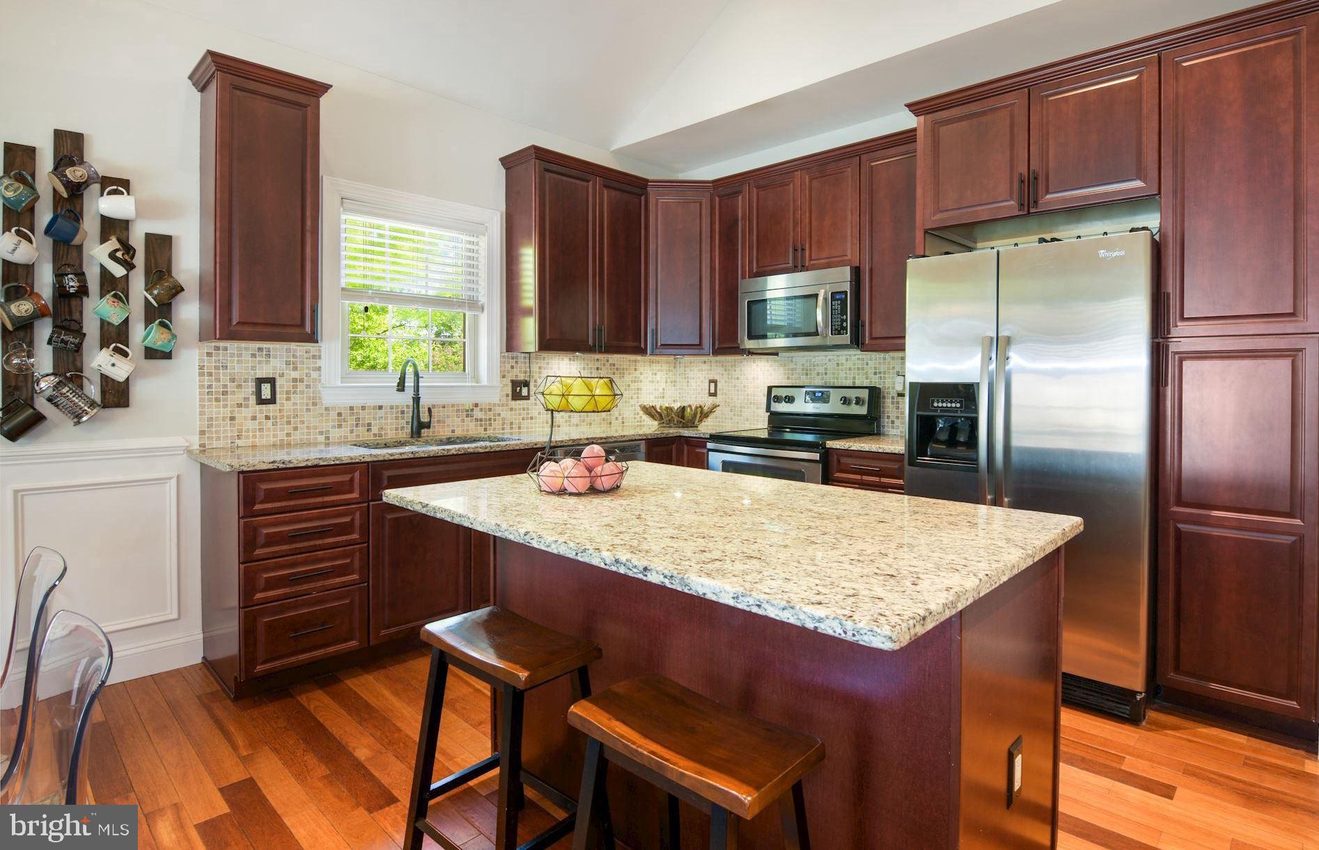 458 Riverside Drive Pasadena, MD 21122 - Photo 14 of 35 Sleek Granite Island/Dining Bar and Counters