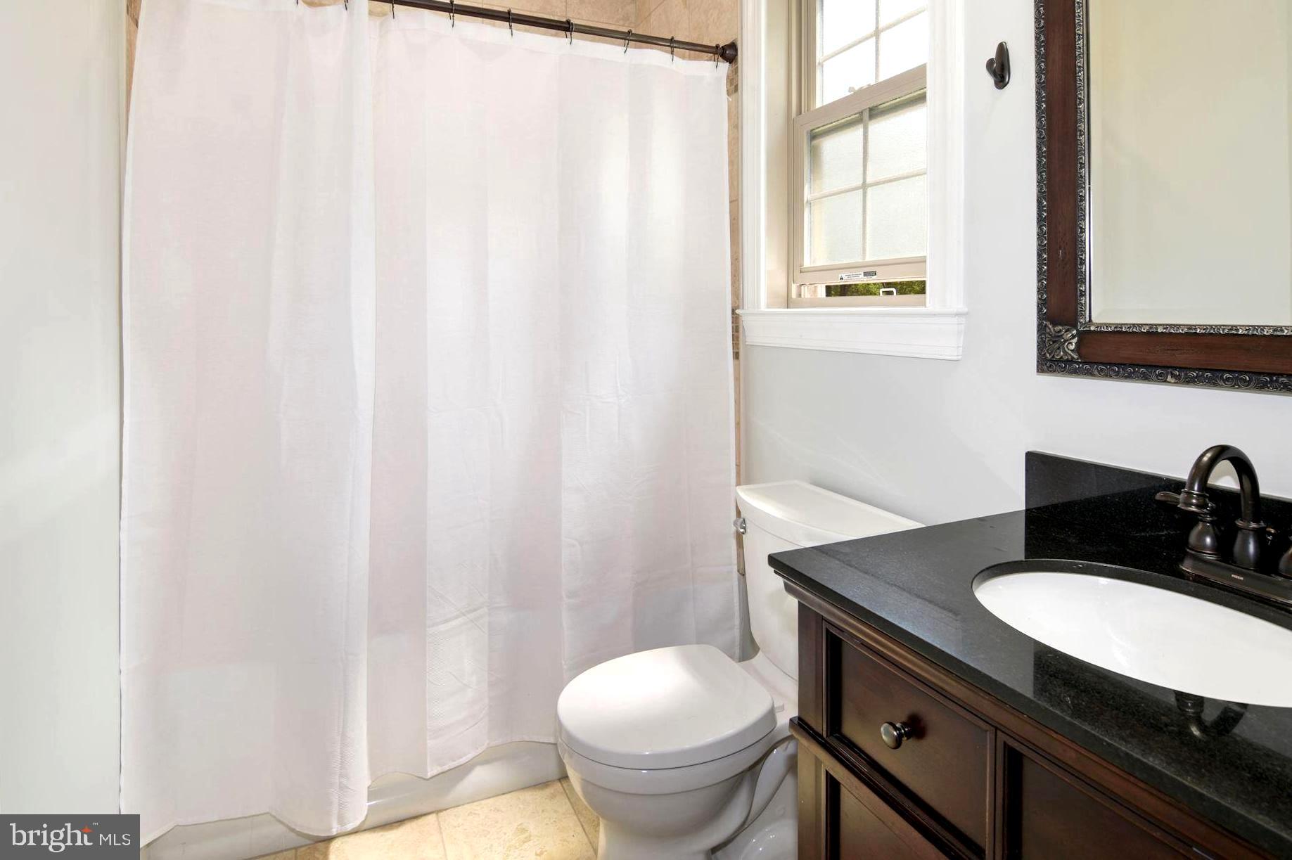 458 Riverside Drive Pasadena, MD 21122 - Photo 27 of 35 Updated Bath Between Upper Level Bedrooms