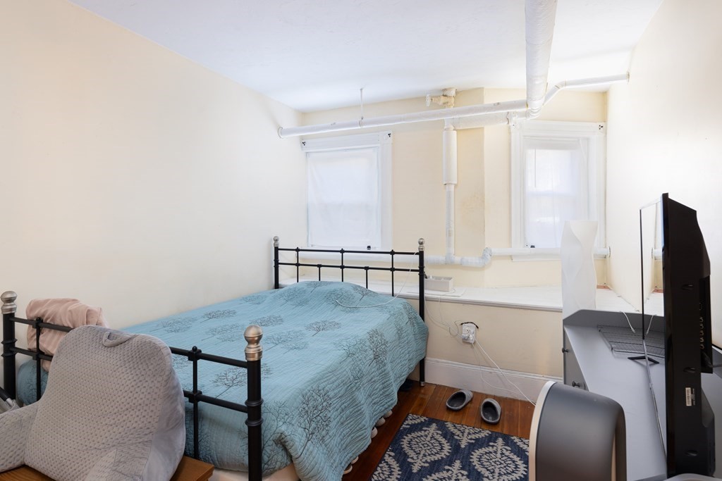 16 Garrison Road, Unit 7 Brookline, MA 02445 - Photo 5 of 9 a view of a workspace with furniture