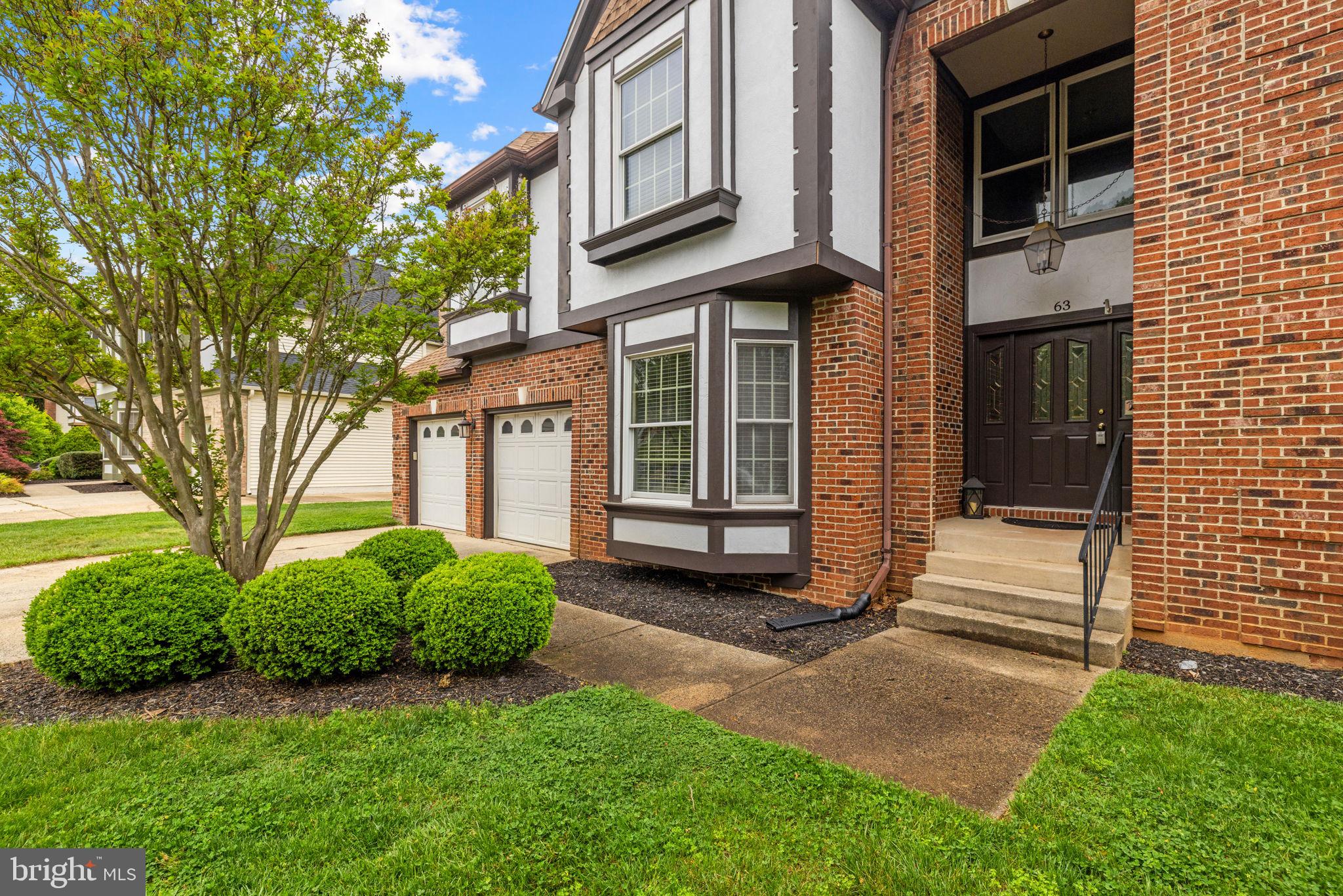 63 Rutherford Circle Sterling, VA 20165 - Photo 3 of 52 Brick front Tudor style home.