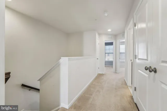a view of a hallway with closet
