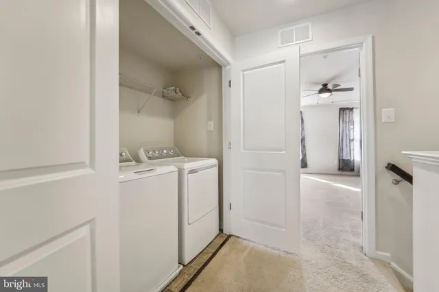 a bathroom with a sink and mirror with toilet