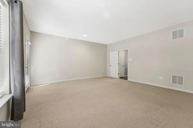 an empty room with an entryway