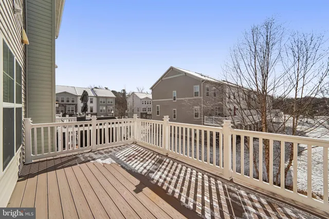 a view of a wooden roof deck