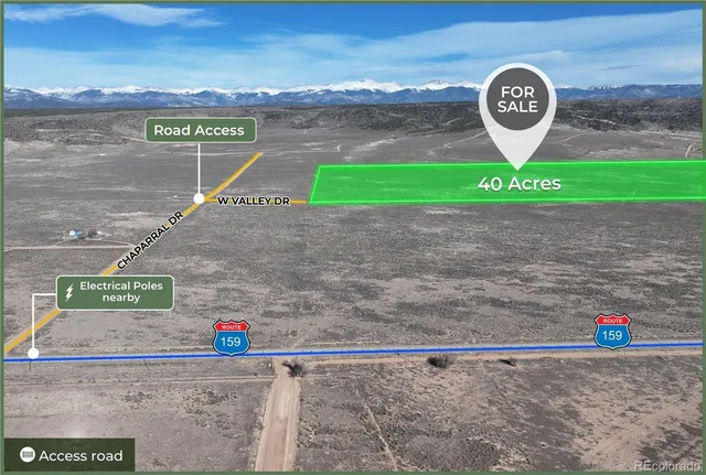 a view of a room with a flat screen tv and a fireplace